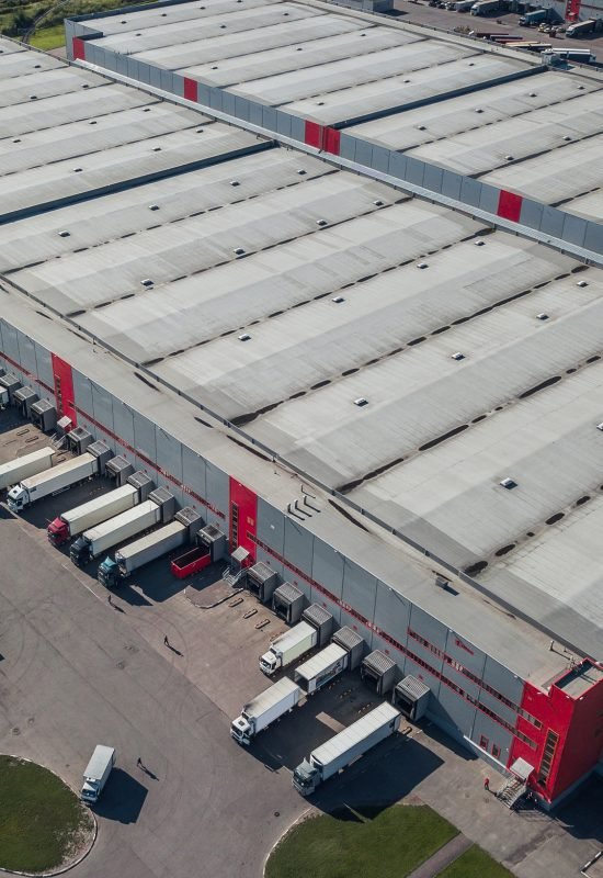 Aerial view of trucks loading at logistic center